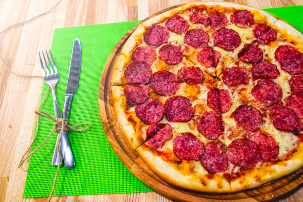 Hot Homemade Pepperoni Pizza Ready to Eat. Bon Appetit