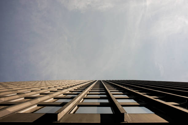 istock perspective view of tall modern city high rise 947482074