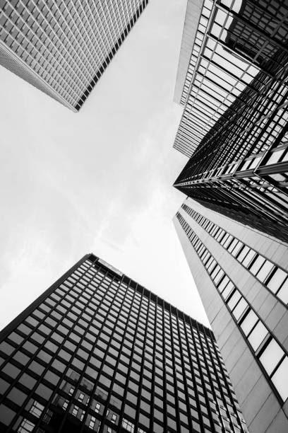 istock tall glass buildings in a modern city 947482794