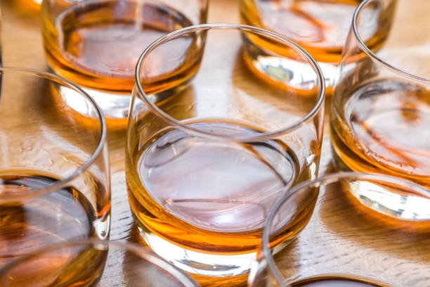 istock Glasses are filled with whiskey on the table 947491024