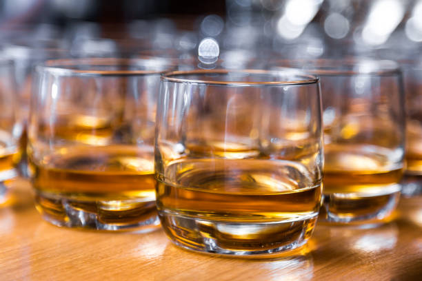 istock Glasses are filled with whiskey on the table 947491240