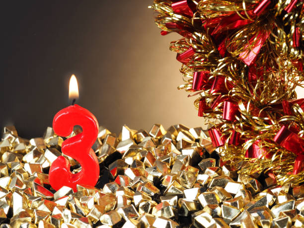 istock Birthday-anniversary candle showing Nr. 3 947501434