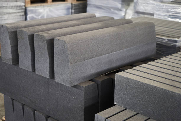 istock Concrete road curbs at the factory 947503022