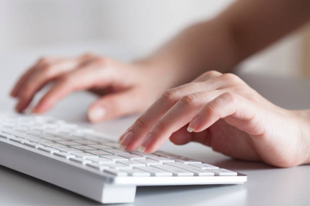 istock woman typing keyboard of computer 947522130