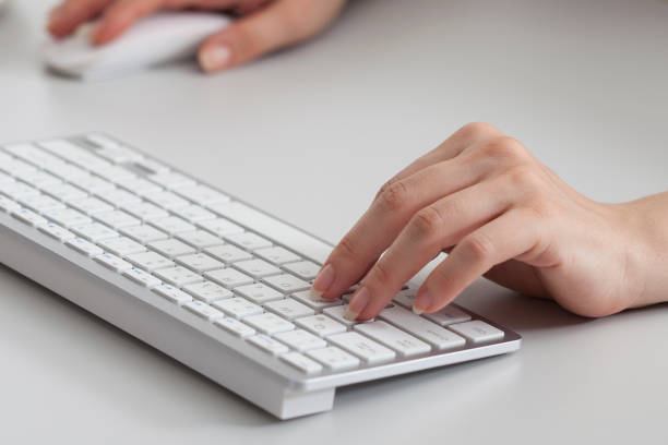 istock woman typing keyboard of computer 947522436