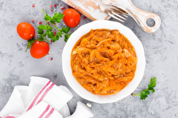 istock Cabbage stew. Cabbage braised in tomato sauce 947527226