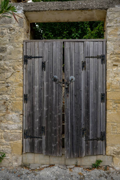 istock Locked closed wooden doors 947533316