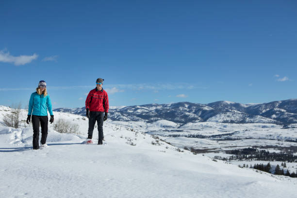 istock Snowshoeing Couple 947548906