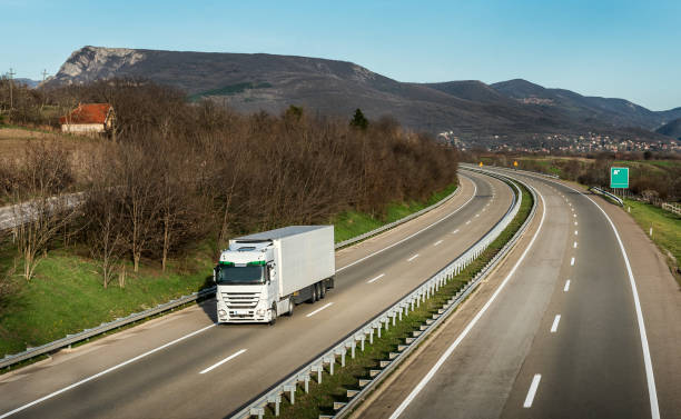 istock White truck on the highway road 947551778