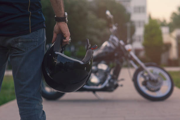 motorcycle driver and helmet stock photo