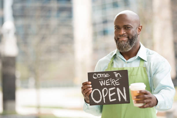 istock Small business owner, man in downtown city area. 947561018