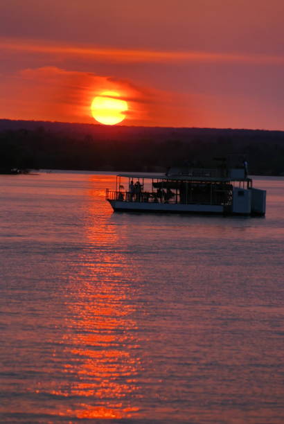 istock Pontoon boats on the Zambezi River at sunset 947564334