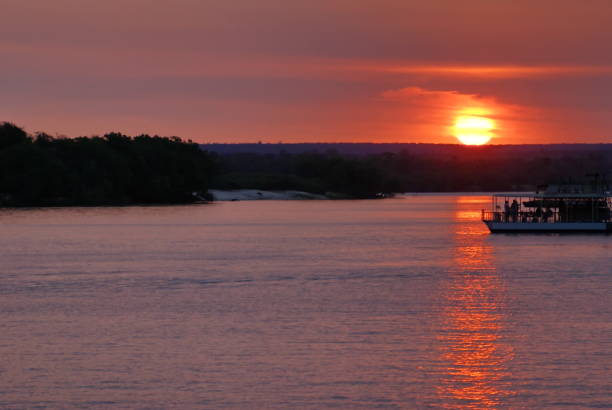 istock Pontoon boats on the Zambezi River at sunset 947564746