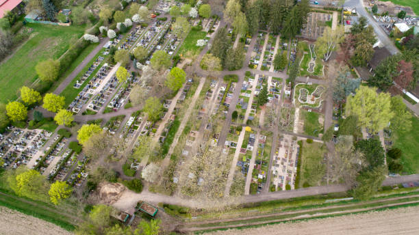 istock Cemetery, unrecognisable graves - aerial view 947583282