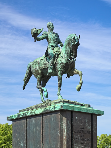 Equestrian statue of William II, King of the Netherlands, Grand Duke of Luxembourg in The Hague. The statue was erected in 1924 on Buitenhof square close to Hofvijver pond. This is a replica of the equestrian statue in Luxembourg from 1884 by the French sculptors Antonin Mercie (1845-1916) and Victor Peter (1840-1918). Text on the pedestal reads: To king Willem II The Dutch people 1853.
