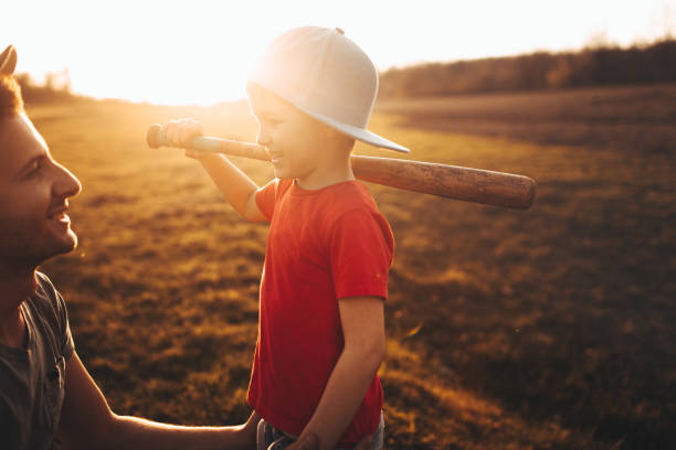 istock Father and son getting ready for a game of baseball 947600552