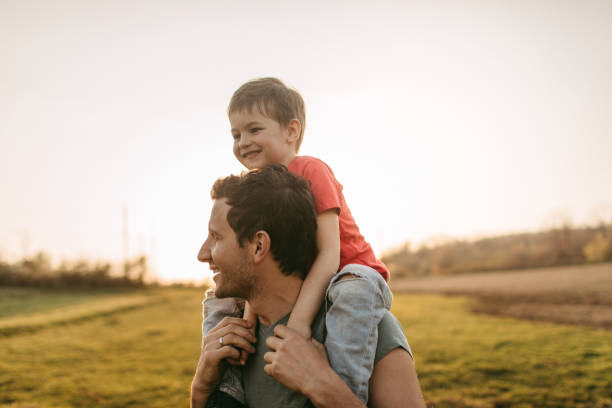 istock Piggyback ride in nature 947601248