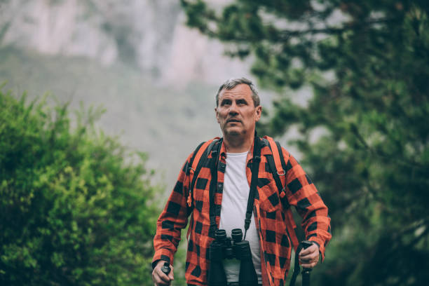 istock Senior man hiking on mountain 947618542