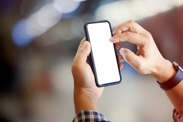 istock Man hand with white screen smartphone 947633616