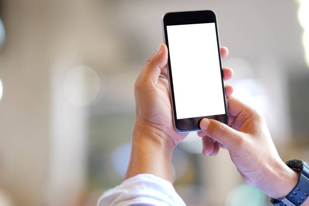 istock Man hand with white screen smartphone 947633622