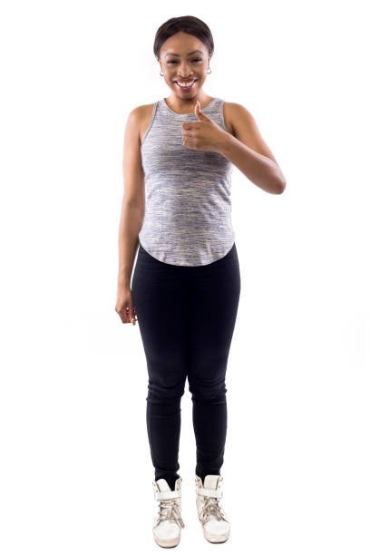 traineron noir femme fitness fond blanc avec thumbs up - endorsement appreciate validate thumbs up photos et images de collection