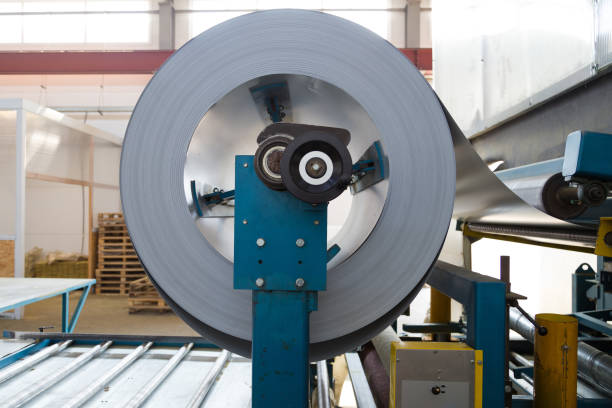 istock Industrial metal sheet coil for metal sheet forming machine in workshop 947649028
