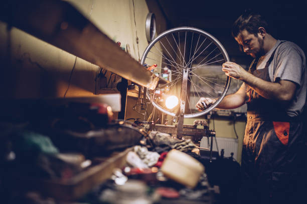 istock Man working hard in repair shop 947649078