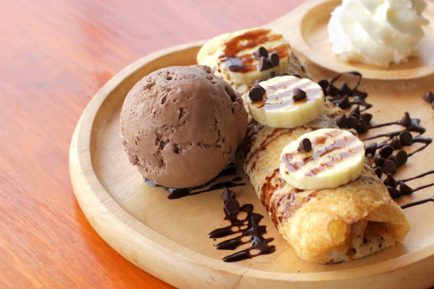istock crepe with banana and chocolate ice cream 947651592