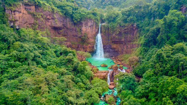 istock Beautiful Cikaso waterfall with green trees 947652346
