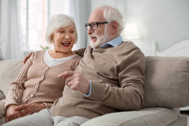 istock Delighted senior couple relaxing at home 947656572