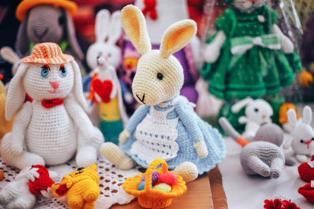 istock Knitted Chicken and Bunny with Easter egg. Easter toys 947660610