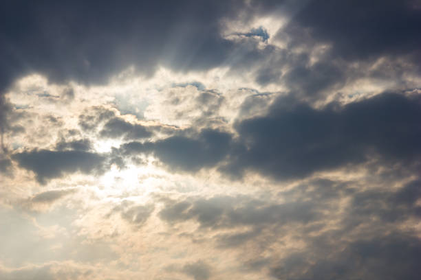 scenic of amazing cloudscape with god ray light beams background