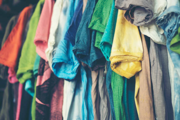 istock colorful clothes hanger at night market 947673486
