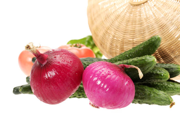 With a white clipping pass separated by various fresh vegetables