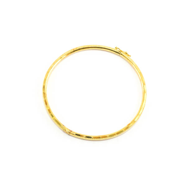 istock gold bracelet isolated on white background 947683216