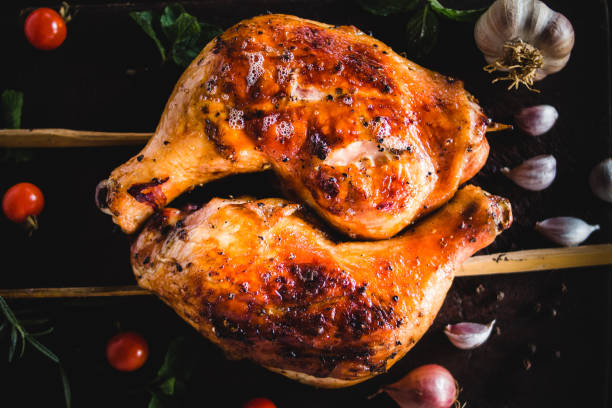 istock Chicken Hips Garlic pepper grilled Placed on a wood chopping board 947683472