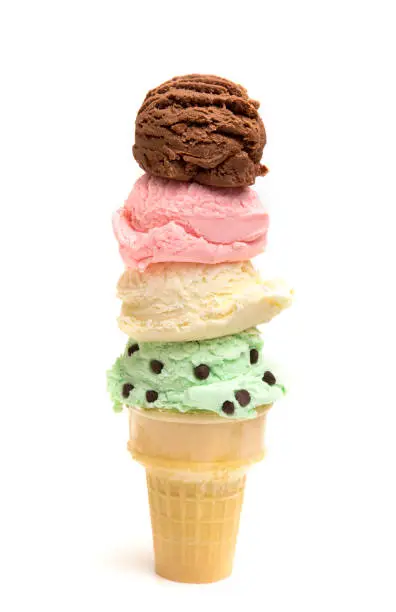 Photo of Quadruple Stack of Ice Cream Scoops on a Sugar Cone