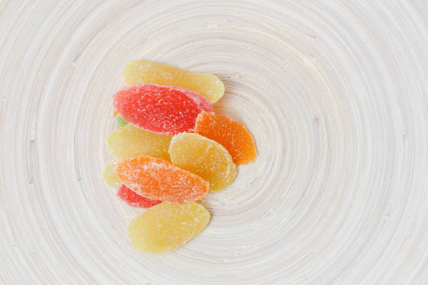 istock pineapple candied fruit on a wooden plate 947687520