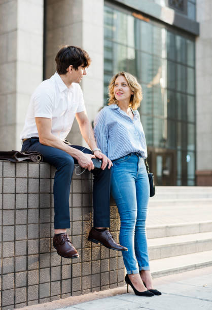 istock Sweet couple sharing music together 947690812