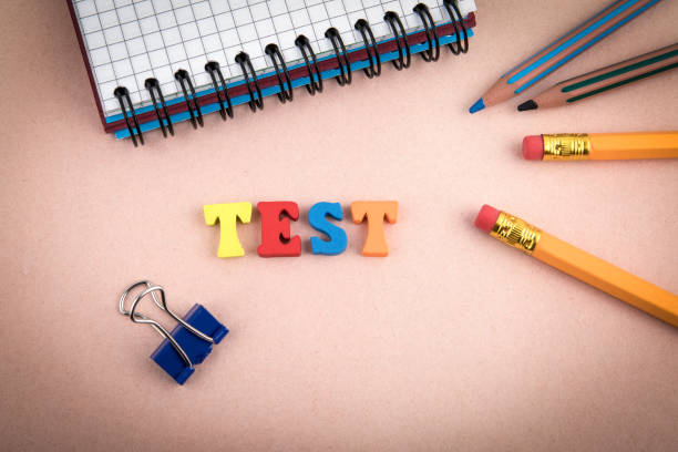 istock Test. Wooden letters on the office desk 947693016