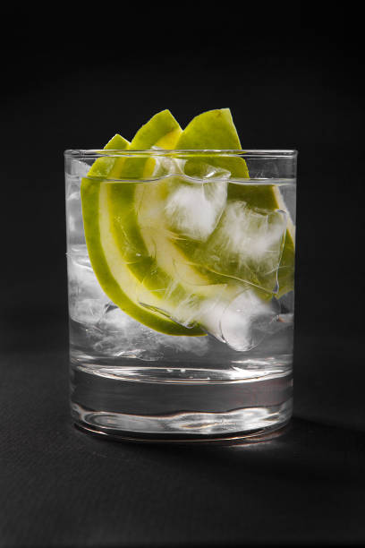 istock Summer cocktail on isolated black background 947694532