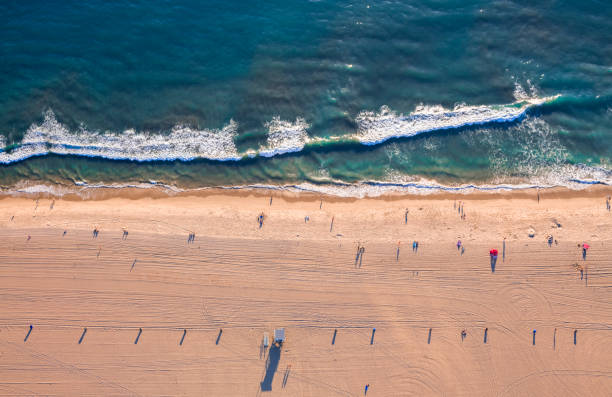 Aerial View of Santa Monica Beach Aerial view looking down on Santa Monica beach near sunset santa monica stock pictures, royalty-free photos & images