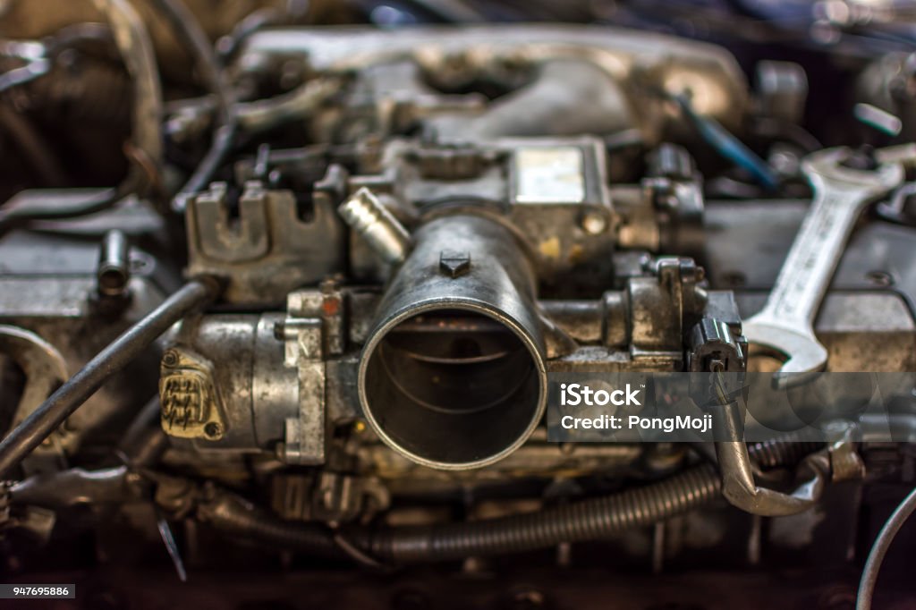 Disassembled car dirty engine close-up to engine parts at car garage Backgrounds Stock Photo