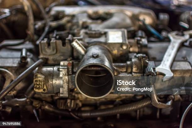 Disassembled Car Dirty Engine Closeup To Engine Parts At Car Garage Stock Photo - Download Image Now