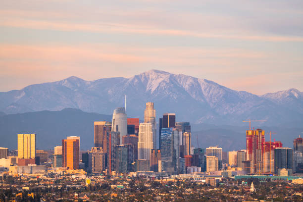 Downtown Los Angeles Skyline with Mountains Behind stock photo