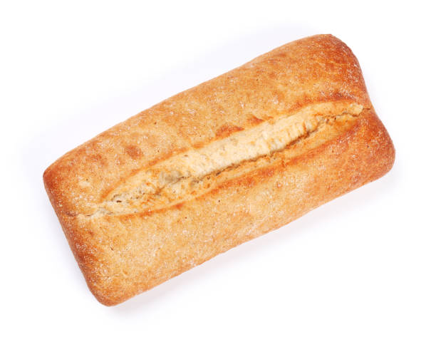 Loaf of crusty ciabatta bread Loaf of crusty ciabatta bread. Isolated on white background. Top view ciabatta stock pictures, royalty-free photos & images