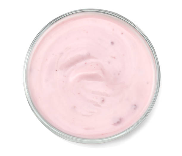 istock Healthy raspberries yogurt isolated on white background. Top view. 947704200