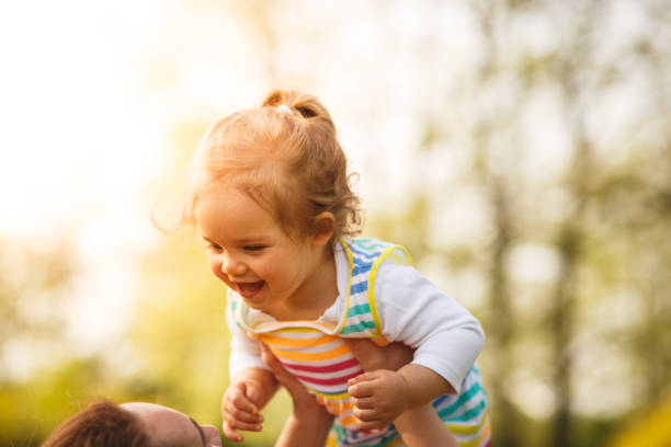 istock Joyful girl playing outdoors 947708372
