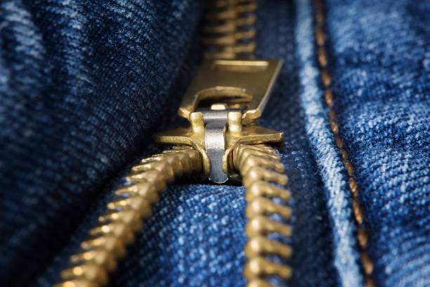 istock Unzipped zipper closeup on jeans 947710362