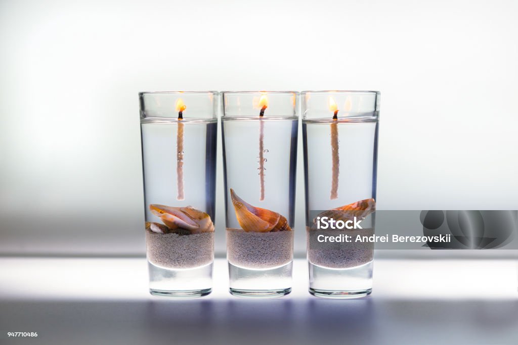 Three Decorative Gel Candles Stock Photo - Download Image Now - Candle,  Glitter, Transparent - iStock